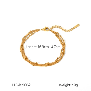 Detailed size specifications for triple-layered gold chain bracelet with length markings