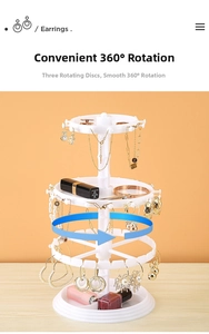 Three-tier rotating jewelry organizer with hooks for earrings and segmented base tray