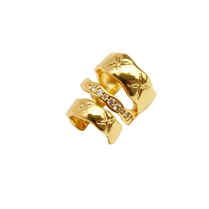 Three-layer gold-plated ear cuff featuring star patterns and sparkling zircon inlays
