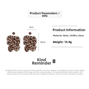 Detailed view of leopard print chiffon petal earrings with size measurements 6x10cm
