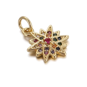 Detailed macro view of an 18K gold star pendant set with vibrant multi-color gemstones