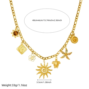 Gold stainless steel necklace with tiger eye stone and multi-element charms on white background