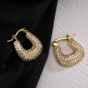 Luxe gold-plated U-shaped horseshoe earrings with sparkling pave-set white cubic zirconia