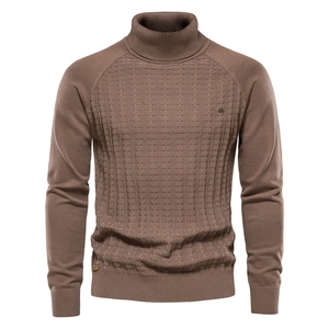 Close-up of brown knit sweater texture with vertical weave pattern and high turtleneck