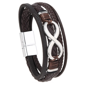 Detail of multi-layer brown leather bracelet with silver infinity symbol and magnetic clasp