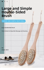 Close-up of double-sided wooden bath brush with natural bristles and massage nodes