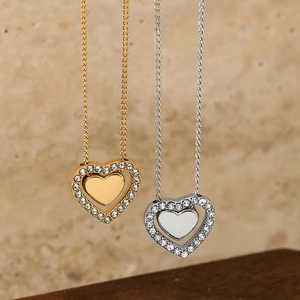 Fashion heart pendant necklaces in gold and silver finish with crystal pavé setting