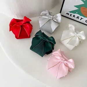 Chaussettes hautes en coton peigné pour filles avec grand nœud en satin et bord doré