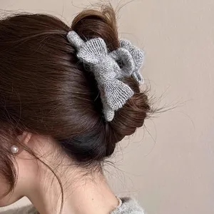 Elegant grey knitted bow hair claw clip for women's autumn winter hairstyle accessory