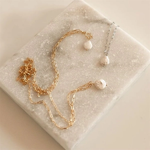 Minimalist paperclip link necklace with natural baroque pearl pendant in gold and silver