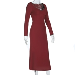 Detail view of dark red long-sleeve dress with slimming waist and sweetheart neckline
