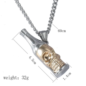 Detail showing dimensions of silver and gold skull bottle opener pendant on 60cm chain
