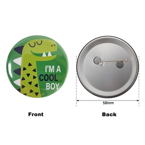 58mm cartoon dinosaur tinplate badge for kids featuring a green dino and metal safety pin