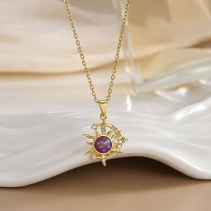 Gold sun and moon pendant necklace with a purple opal stone and micro-pave crystals