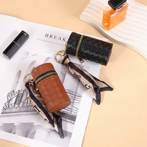 Fashion woven round coin purses in black and caramel with silk scarf and gold keychain