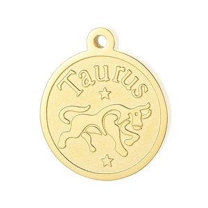Polished gold Taurus zodiac pendant with engraved bull symbol and lettering on white