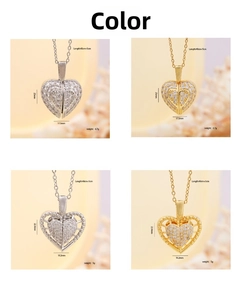 Macro detail of heart pendants with white zircons in gold and silver finishes