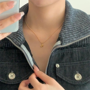 Minimalist 925 sterling silver golden beaded necklace with an eight-pointed star pendant
