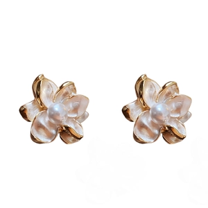 Elegant floral pearl stud earrings with enamel petals and gold plating on white background