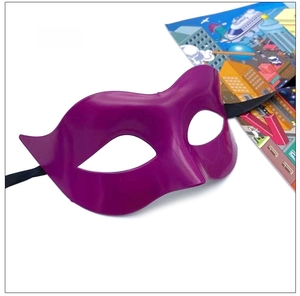 Detail of rose red half face masquerade mask for men with satin ribbons on white background