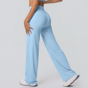 Detail view of high waisted flared yoga pants featuring light blue brushed fabric