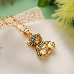 18K gold plated necklace featuring a bear pendant with sparkling green zircon stones
