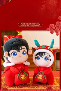 Detailed shot of pair of 2024 Year of the Dragon mascot plush dolls in festive red outfits