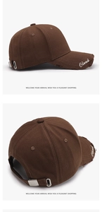 Detail of distressed brim and side Cloud embroidery on a dark brown baseball cap