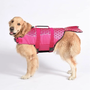 Detail of mermaid tail dog life jacket with pink fish scales and heavy-duty handle