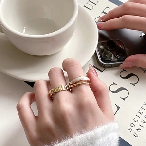 Luxurious gold-plated adjustable ring set with shell inlay and geometric diamond accents