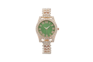 Detail of rose gold diamond watch with deep green dial and Roman numerals