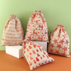 Christmas burlap drawstring gift bags set with festive patterns and Merry Christmas text