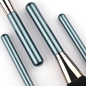 Detail of 12pcs dark blue glitter handles with rose gold ferrules and soft fiber bristles