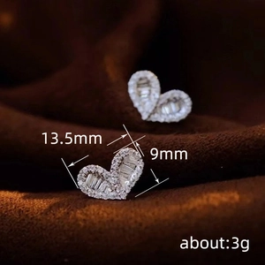 Minimalist silver heart stud earrings with sparkling pavé crystals and size dimension 13.5mm