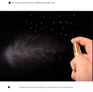 Detail showing the fine mist spray nozzle of a 10ml golden aluminum perfume bottle