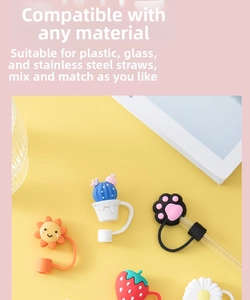 Detailed view of silicone cartoon straw covers compatible with plastic and glass straws