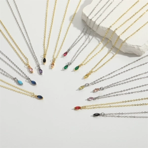 Minimalist elliptical gemstone necklace collection in gold and silver finish options