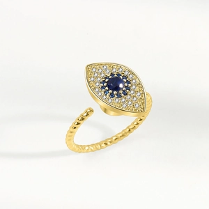 Golden S925 sterling silver evil eye spinner ring with blue crystals and twisted band