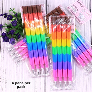 Detail of multi-color stackable pencils in plastic packaging on a wood background