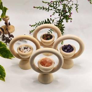 Vertical wooden diffusers with colorful natural crystal stones for essential oil aromatherapy