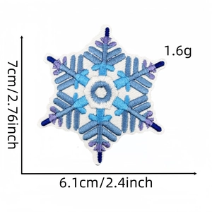 Detailed size chart of blue snowflake embroidery patch with measurements 7cm by 6.1cm