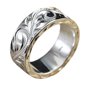 Hawaiian style wide silver ring with golden edges and floral vine relief engraving