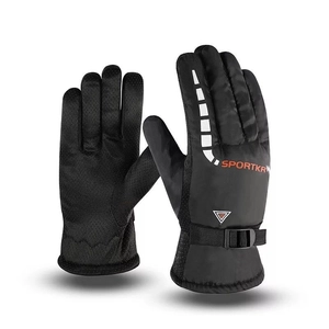 Detail view of winter cycling gloves with anti-slip palms and adjustable wrist straps