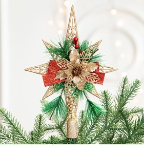 Detail of glittered star tree topper with red bow and pine cones on Christmas tree