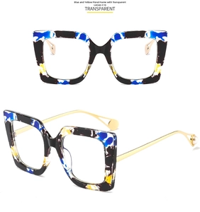 Detail of floral tortoiseshell square frames with gold metal temples and pearl tips