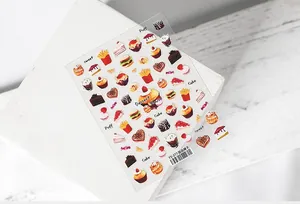 Detailed view of TS-277 5D nail art stickers featuring dessert and fast food illustrations