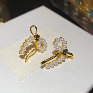 Vintage 18k gold plated pearl earrings with black camellia flower and metal bow