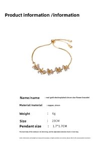 Detail view of gold-plated star flower bracelet with zircon stones on snake chain