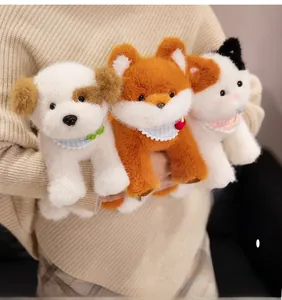 Detail of plush cat, dog, and fox toys with lace scarves being held in a cozy hug
