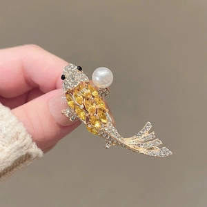 Elegant gold koi fish brooch with yellow crystal scales and white pearl accent